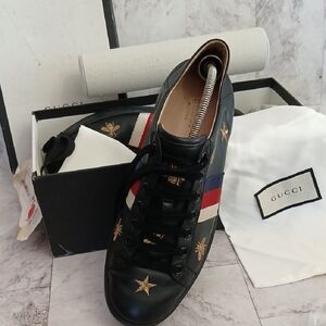Gucci Authentic Black Leather Sneakers with Gold Stars and Red-Blue Stripes